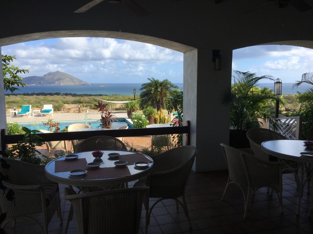 Bella Vista patio restaurant at Mount Nevis hotel for Breakfast with a poolside view