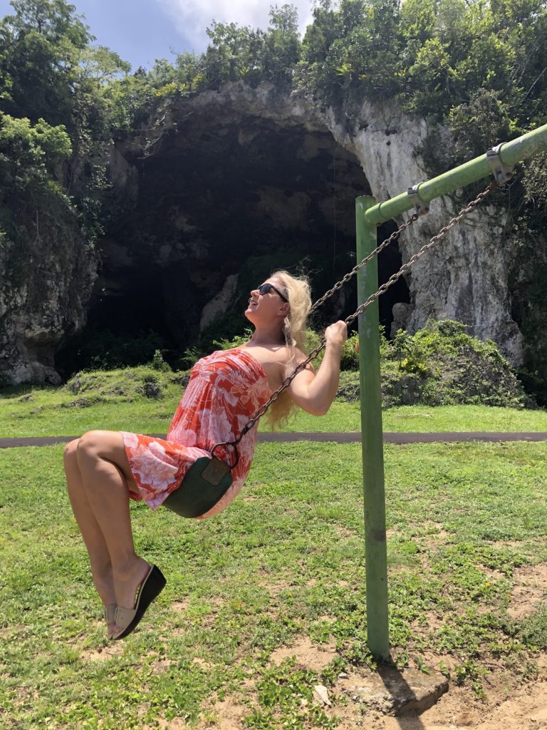 Jen There Done That having fun in the playground at the Parque Historico of Cueva Maria de la Cruz in Loiza, Puerto Rico